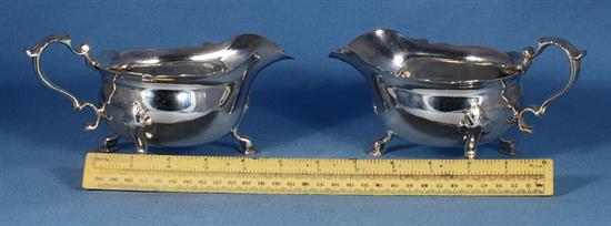 A pair of George II silver sauce boats, attributed to Joseph Sanders, length 195mm, weight 24.4 oz/760grms.